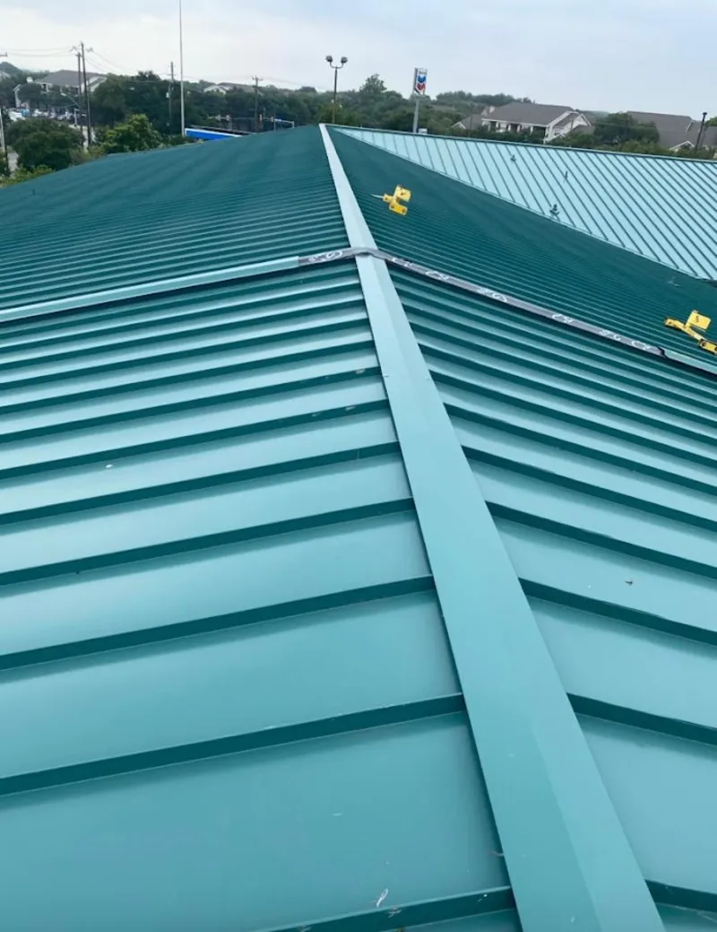 Green commercial metal roof ridge and valley for Metal Roof Repair in Takoma Park